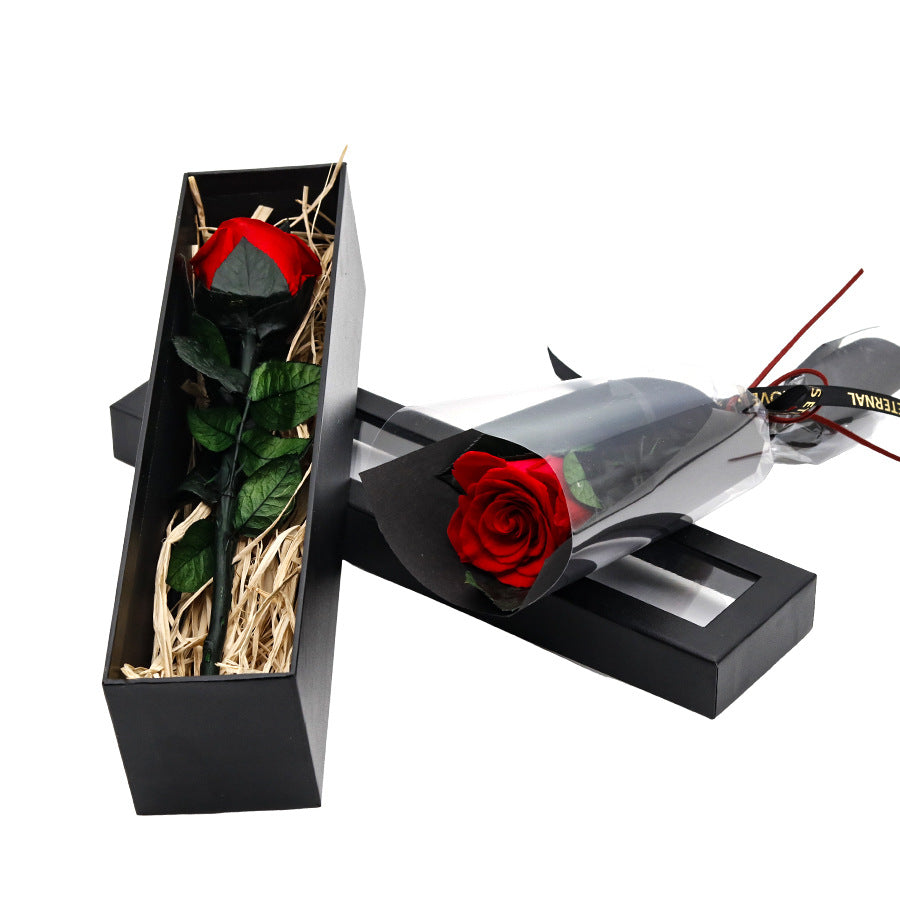 Single rose with stem in a box